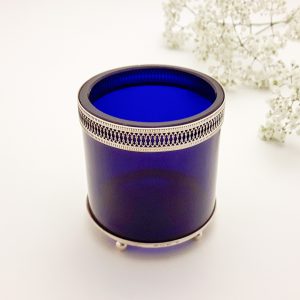 Lepelvaasje blauw glas met decorrand zilver